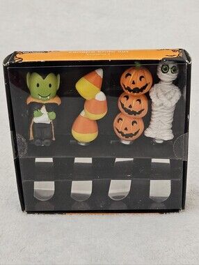 The Pier 1 Imports Halloween Canape Knife Set (4) featuring a spooky Halloween